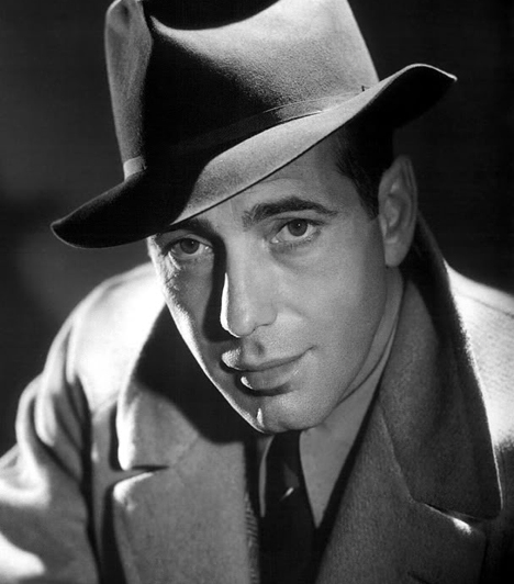 Humphrey BogartA vérszomjas Henrikkel szemben a 30-as évek filmsztárja, Humphrey Bogart az a férfitípus, akit a ringó csípő, a magas sarok és egy erotikusan rúzsozott száj vezet. Ami azt illeti, a filmvásznon és a mozin kívül egyaránt Lauren Bacall volt az ő femme fatale-je.