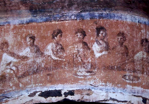 	A kenyértörést ábrázoló freskó a Priscilla-katakombában.